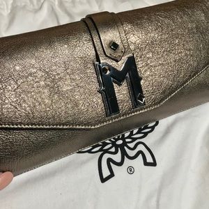 Authentic mcm clutch purse bronze black